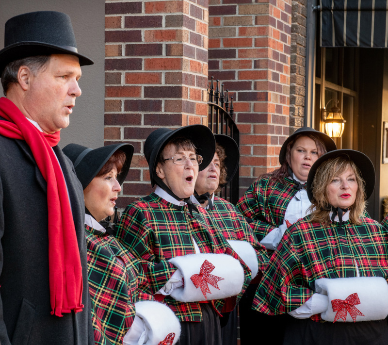 People Christmas Caroling