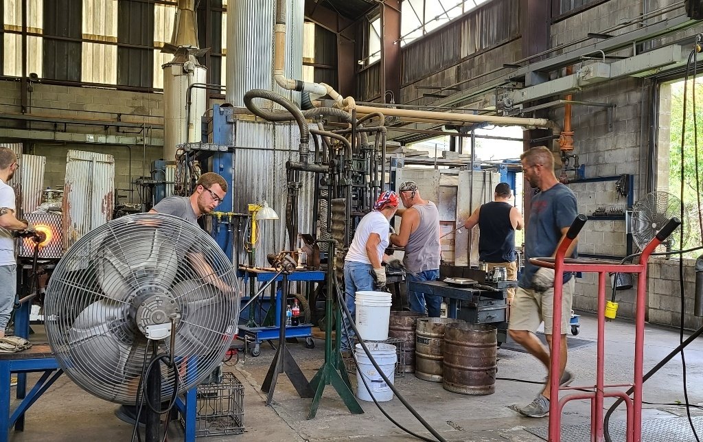 Men working in a glass factoryr